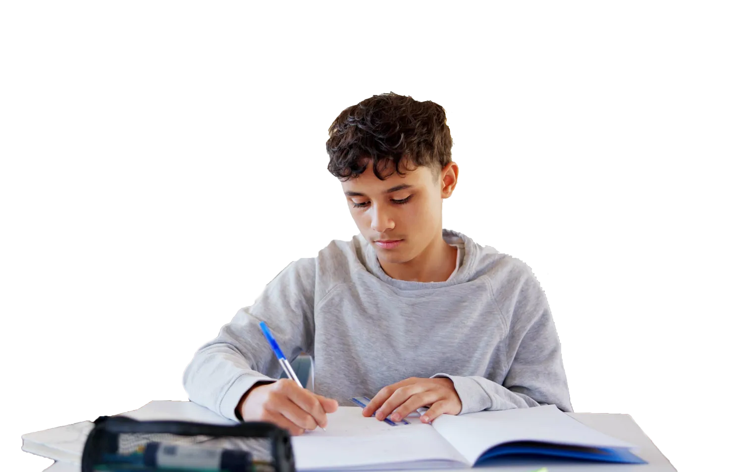 Student Writing in Class with a pen