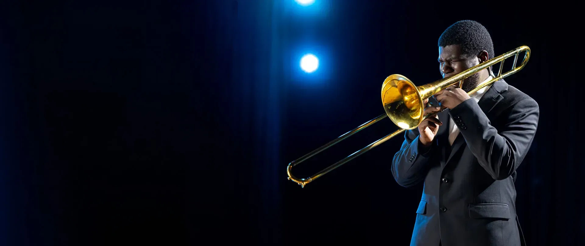 Student playing an instrument