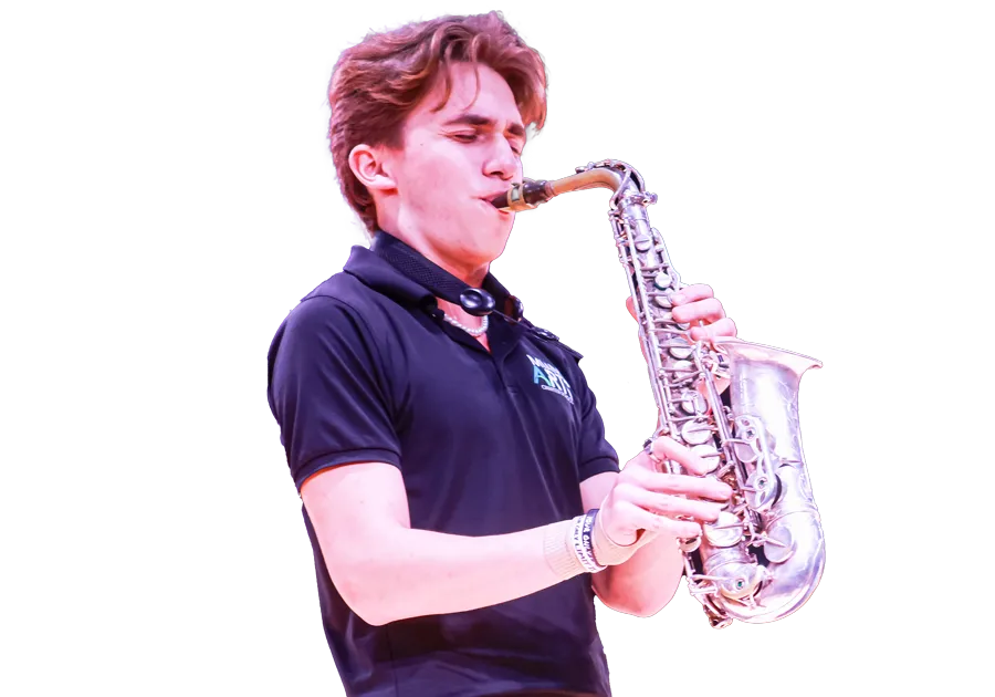 Student playing saxophone instrument
